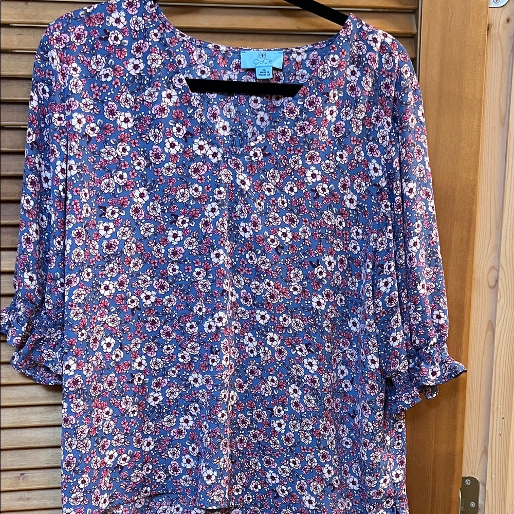 Smart sell glitch—support contacted. 
CeCe Floral Blouse in Blue and Red